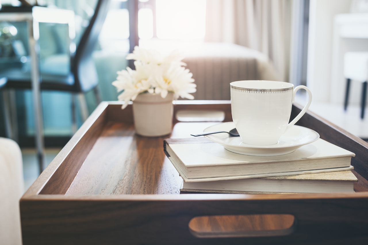 Coffee-cup-Book-white-flower-on-wooden-tray-Interior-decoration-