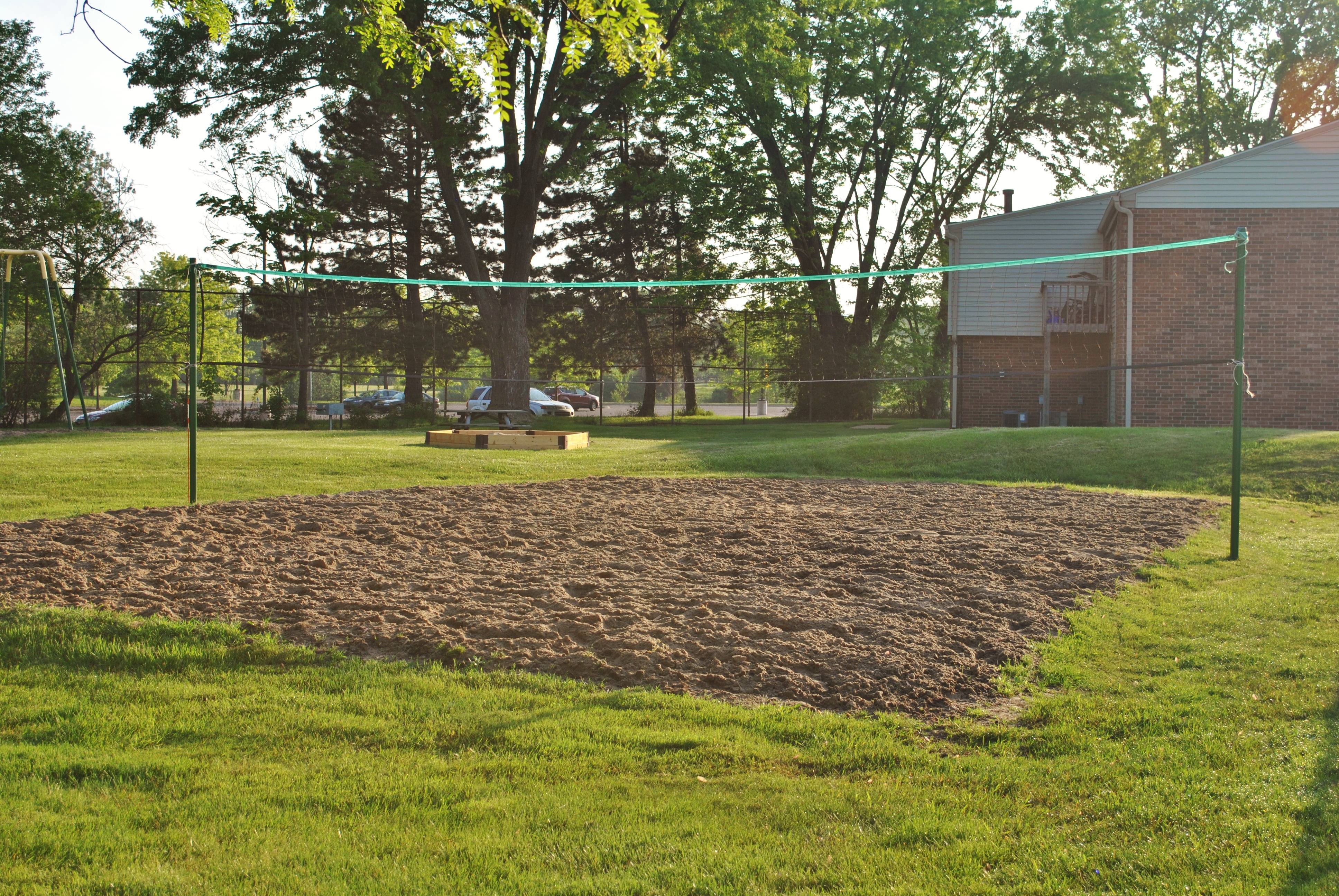 OUTDOOR VOLLEYBALL COURT at Fairway Club Apartments, located in prestigious Canton, MI